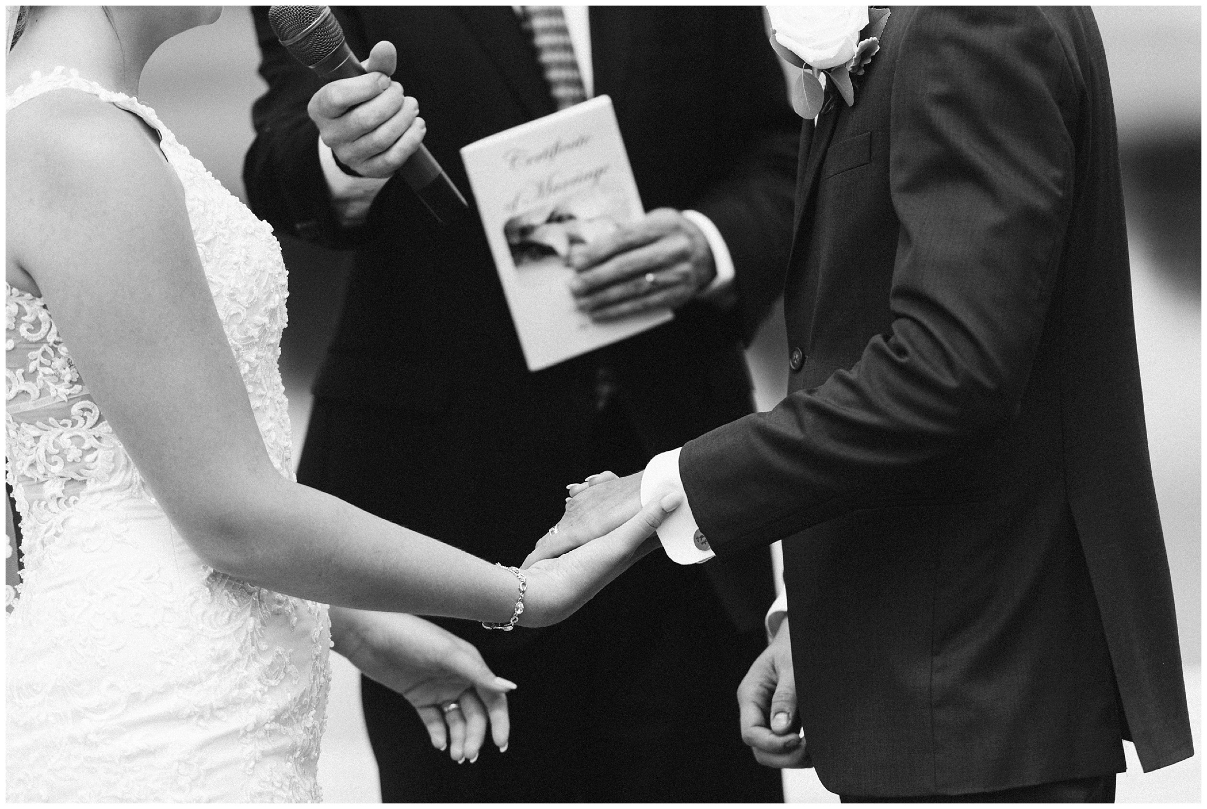 bride and groom holding hands during ceremony in alachua fl