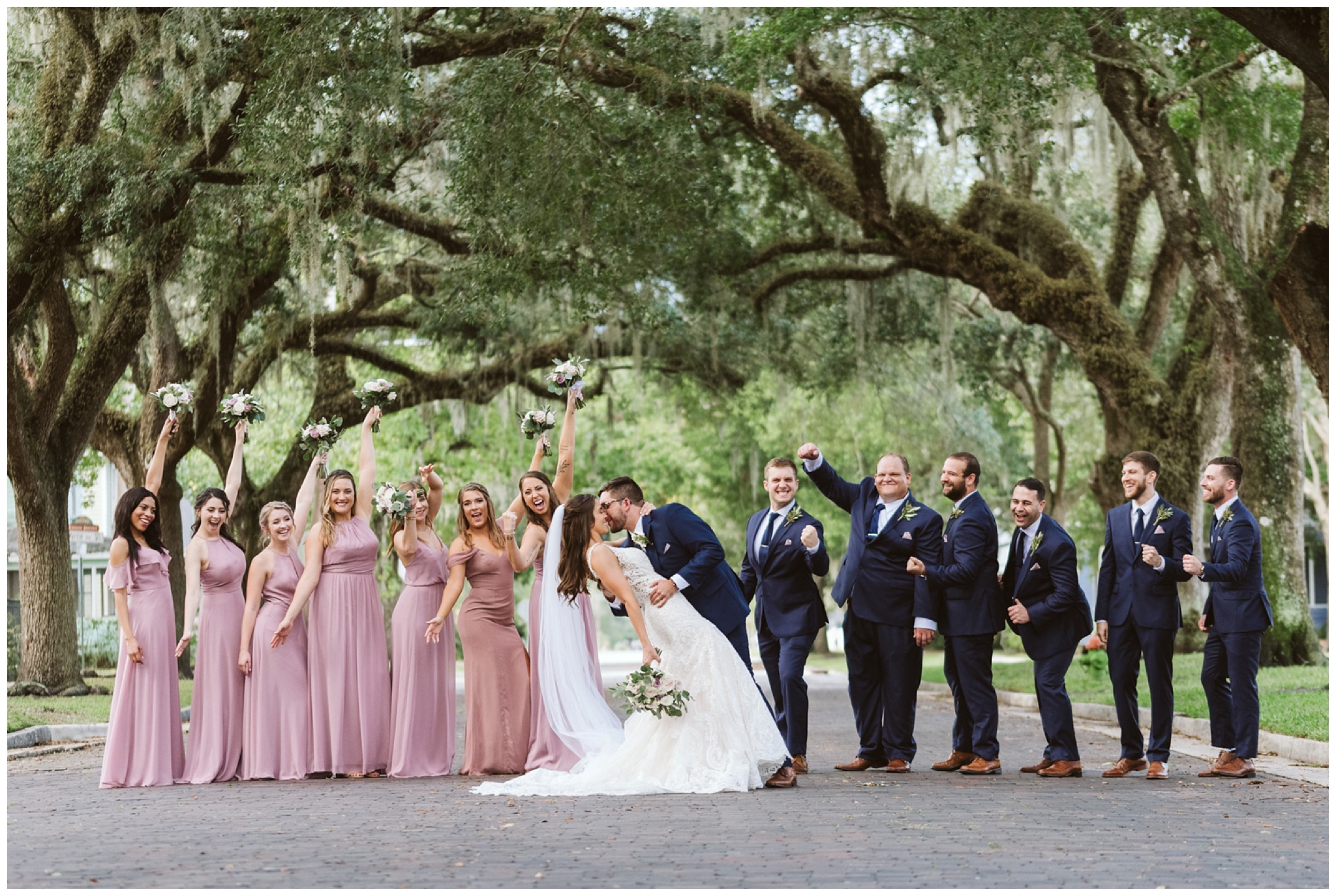 wedding party picture under oak trees