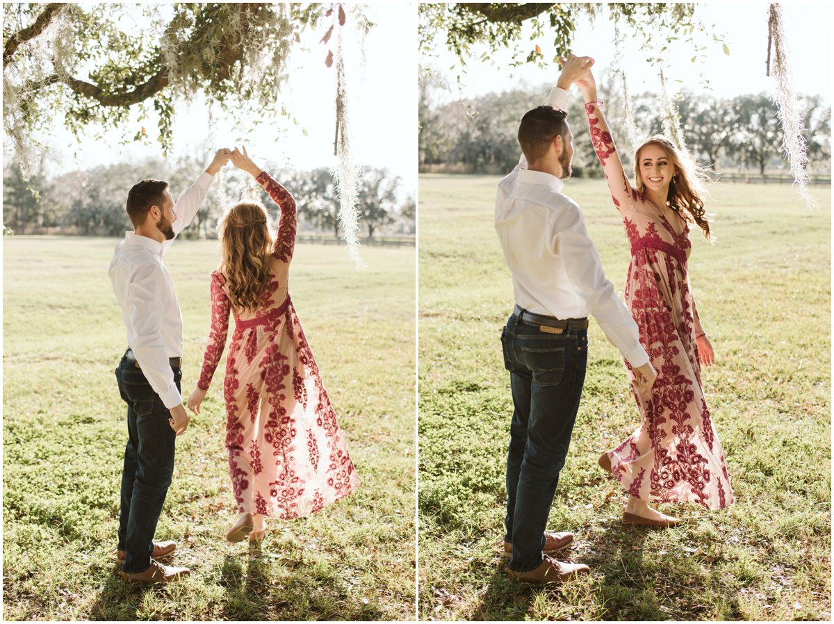 couple dancing in sunny field 