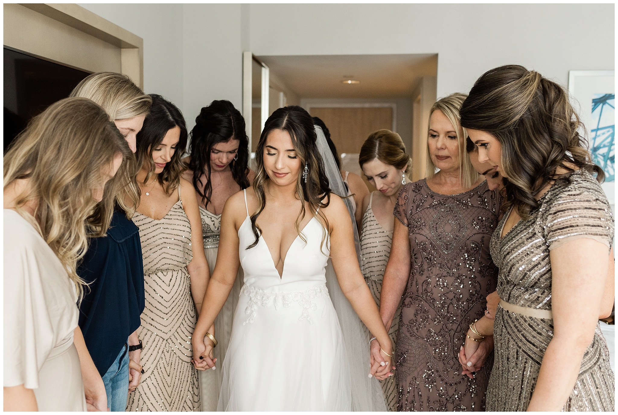 Prayer with bride and bridesmaid before her Glass Factory wedding