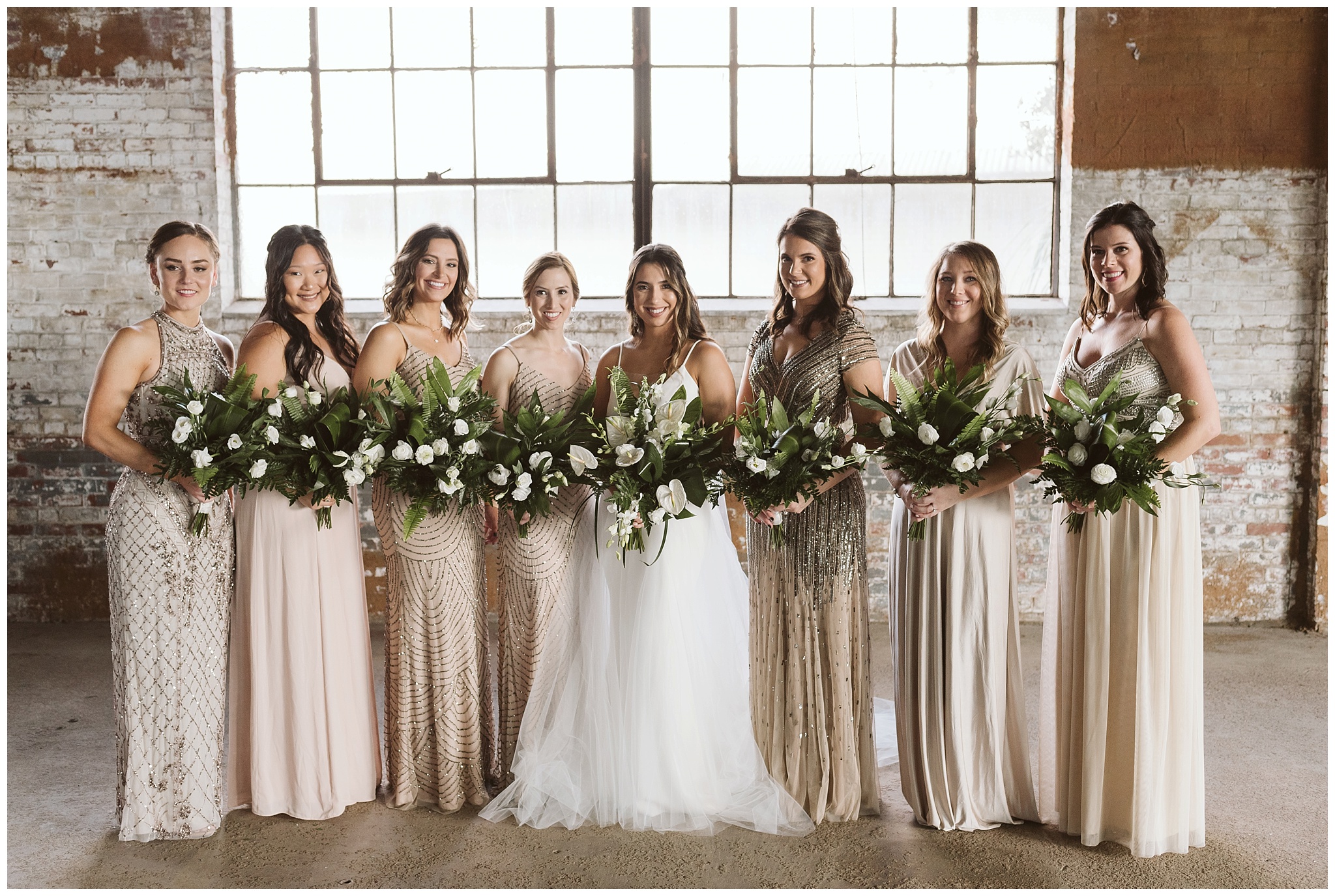 bridesmaids posing in warehouse jacksonville fl 